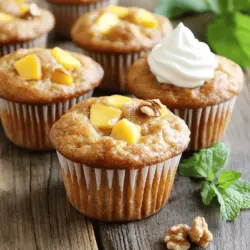 To make delicious brown butter peach muffins, gather these simple ingredients: - 1 cup unsalted butter - 1 ½ cups all-purpose flour - 1 teaspoon baking powder - ½ teaspoon baking soda - ½ teaspoon salt - 1 cup brown sugar, packed - 2 large eggs - 1 teaspoon vanilla extract - 1 cup ripe peaches, diced (fresh or canned, drained) - ½ teaspoon ground cinnamon - ½ cup chopped walnuts or pecans (optional) Each ingredient plays a key role. The unsalted butter gives a rich flavor. When you brown it, the nutty taste adds depth. The flour, baking powder, and baking soda create the perfect texture. Brown sugar adds sweetness and moisture. Eggs help bind everything together. Ripe peaches bring freshness and juicy bites. Ground cinnamon gives warm notes, and nuts add crunch. You can swap the nuts if you need a nut-free version. Fresh peaches work best, but canned peaches are fine too. For the full recipe, check the instructions mentioned earlier! Start by preheating your oven to 350°F (175°C). This step is key for even baking. Next, take a muffin tin and line it with paper liners or grease it with cooking spray. This helps prevent sticking and makes for easy cleanup. Now, let's brown the butter. In a medium saucepan, melt 1 cup of unsalted butter over medium heat. Keep an eye on it as it cooks. Swirl the pan every now and then. After about 5-7 minutes, the butter should turn golden brown and smell nutty. Turn off the heat and let it cool slightly. While the butter cools, grab a large bowl. In it, whisk together 1 ½ cups of all-purpose flour, 1 teaspoon of baking powder, ½ teaspoon of baking soda, ½ teaspoon of salt, and ½ teaspoon of ground cinnamon. This mixture will give your muffins a nice lift and flavor. In another bowl, combine 1 cup of packed brown sugar and the browned butter. Mix them well. Next, add 2 large eggs, one at a time, whisking after each addition. Stir in 1 teaspoon of vanilla extract. This blend will make your muffins rich and sweet. Now, it's time to mix the two bowls. Gradually add the dry ingredients to the wet mix. Stir until just combined. Be gentle here; overmixing can lead to tough muffins. You want a few lumps, and that’s okay! Next, fold in 1 cup of diced peaches and ½ cup of chopped walnuts or pecans if you choose to use them. These add a lovely texture and flavor to your muffins. Make sure the peaches are evenly distributed throughout the batter. Spoon the batter into the prepared muffin tin. Fill each cup about ¾ full. This ensures they have room to rise without overflowing. Place the tin in the oven and bake for 18-22 minutes. Check for doneness by inserting a toothpick into the center. If it comes out clean, your muffins are ready! Once baked, let them cool in the tin for 5 minutes. Then, transfer them to a wire rack to cool completely. Enjoy your delightful brown butter peach muffins! For more details, refer to the Full Recipe. To brown butter, heat it in a medium saucepan. Use medium heat to melt the butter. Stir it gently as it cooks. Watch for the color change. The butter will turn golden brown and smell nutty. This takes about 5 to 7 minutes. Remove it from heat as soon as it reaches that color. Let it cool slightly before adding to your mix. Browned butter adds a rich flavor to your muffins. Set your oven to 350°F (175°C) for baking. This temperature is perfect for even cooking. Bake your muffins for 18 to 22 minutes. Check them by inserting a toothpick. If it comes out clean, they are done. Don’t open the oven door too soon. This can cause the muffins to sink. Mix your wet and dry ingredients until just combined. Overmixing can make your muffins tough. Gently fold in the peaches and nuts. Use a spatula for this step. It helps keep the batter light and fluffy. A light touch gives you a soft muffin texture. If you need to swap ingredients, here are some ideas: - Use coconut oil instead of butter. - Replace all-purpose flour with almond flour for a gluten-free version. - For brown sugar, you can use white sugar mixed with molasses. - If you don't have peaches, try other fruits like nectarines or apples. These swaps can help you customize the recipe to your taste. For the full recipe, check the detailed instructions earlier. {{image_2}} You can change up the flavor of your muffins by using different fruits. Instead of peaches, try ripe pears or juicy blueberries. Each fruit brings its own taste and vibe. Apples make a nice choice too. Just chop them into small pieces. If you use frozen fruit, thaw and drain it first. This keeps your muffins from getting too soggy. Spices can really elevate your muffins. Try adding a pinch of nutmeg for warmth. Cardamom gives a unique flavor that surprises the taste buds. You can also mix in some lemon or orange zest for a bright touch. Don’t forget to play with the vanilla extract. A splash of almond extract adds a lovely twist! If you need gluten-free muffins, swap the all-purpose flour for a gluten-free blend. Make sure it has xanthan gum for the best texture. For nut-free muffins, simply leave out the walnuts or pecans. You could add seeds like sunflower or pumpkin for crunch instead. That way, you still get a tasty treat without the nuts. Explore these variations to make your Brown Butter Peach Muffins even more exciting! For the complete recipe, check out the Full Recipe section. To keep your brown butter peach muffins fresh, store them in an airtight container. This method keeps the muffins moist. If you want them to stay soft longer, place a slice of bread in the container. This tip helps keep the muffins from drying out. Store them at room temperature for up to three days. If you need to keep them longer, consider freezing. Freezing is a great way to save muffins for later. Allow the muffins to cool completely. Wrap each muffin tightly in plastic wrap. Then, place them in a freezer-safe bag or container. This keeps them fresh for about three months. When you are ready to eat them, remove as many muffins as you want from the freezer. To bring back the fresh-baked taste, reheat your muffins. You can use a microwave or an oven. For the microwave, heat each muffin for about 15-20 seconds. If you prefer an oven, preheat it to 350°F. Place the muffins on a baking sheet and warm them for about 5-7 minutes. This will make them warm and soft again. Enjoy them fresh, just like when you first made them! Yes, you can use frozen peaches. Just make sure to thaw and drain them first. This helps keep the batter from getting too wet. Frozen peaches will still taste great in your muffins! To check if your muffins are done, insert a toothpick in the center. If it comes out clean, they are ready. You can also look for a golden top and a slight spring when you touch them. You can make the batter ahead but use it within a few hours. Muffin batter can lose its rise if left too long. If you want to bake later, store it in the fridge until you're ready. These muffins are tasty on their own, but you can serve them warm with whipped cream or ice cream. A sprinkle of cinnamon or fresh mint adds a nice touch too. For the full recipe, check the section above. It has all the steps and tips you need to make these muffins perfect. Enjoy baking! In this post, we explored how to bake delicious brown butter peach muffins. We covered essential ingredients, step-by-step instructions, and helpful tips. You can easily make these muffins your own with variations like different fruits and gluten-free options. Storing and reheating tips ensure you enjoy your treats longer. Baking these muffins brings joy and warmth to your kitchen. Try the recipe, and share it with friends. You’ll love how simple and rewarding this baking adventure can be!